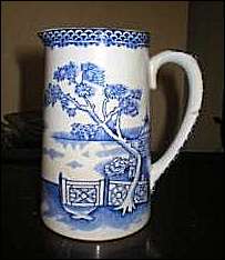 Thomas Till & Sons jug with blue & white decoration. 