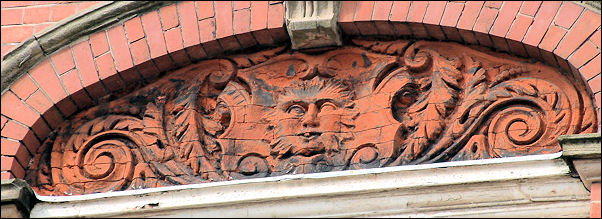 Green Man on the faade of building at corner of Pall Mall