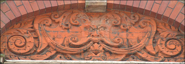 Green Man on the faade of building at corner of Pall Mall