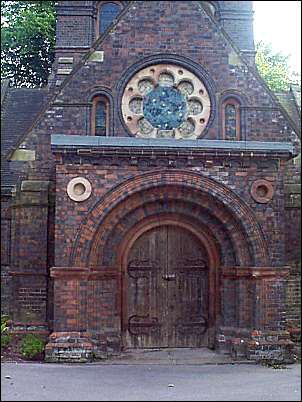 Rose window over porch