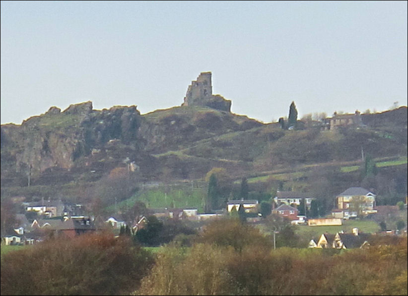 behind the Church of St. Patrick Mow Cop 'castle' can be seen 