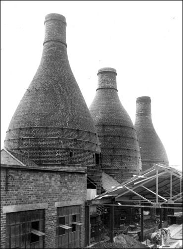 Pottery factory exterior with a view of the bottle ovens at the Dalehall Works