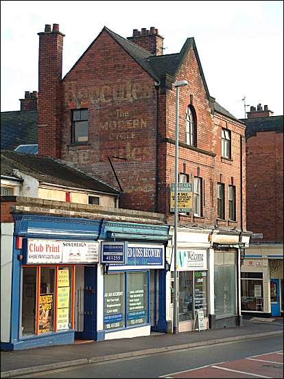 Shops on Hartshill Road - the junction with Geen Street just visible at the right