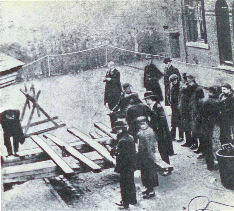 the burial service which was held around the hole on 5th December 1903