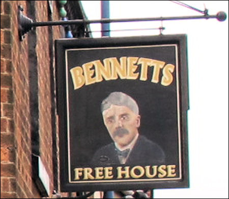 a picture of Arnold Bennett serves as the pub sign 