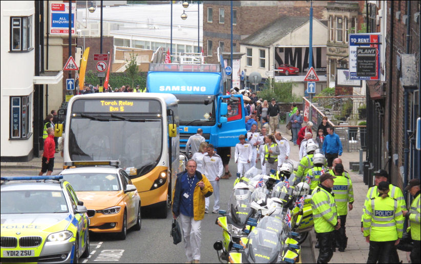 in Albion Street, Hanley the police riders and torch bearers  
