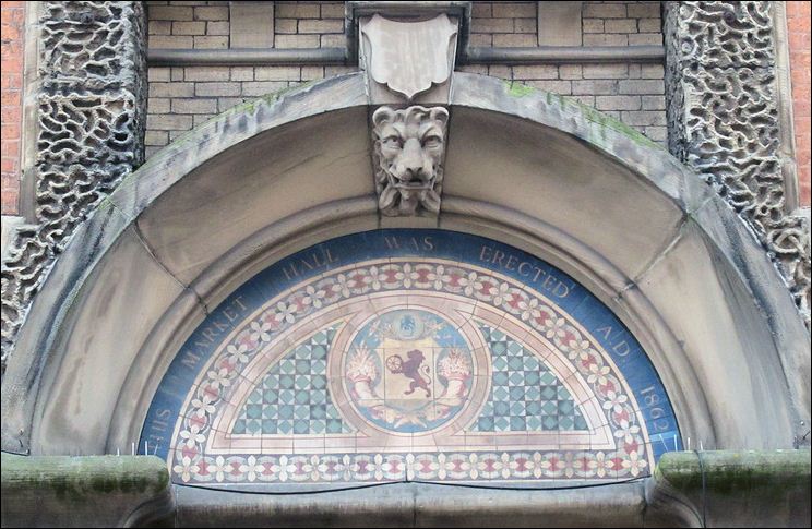the mosaic above the main entrance - 'This Market Hall Was Erected AD 1862'