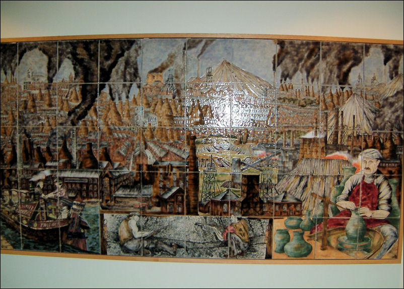 tiled mural showing the canals, coal mines and pottery factories of Stoke-on-Trent