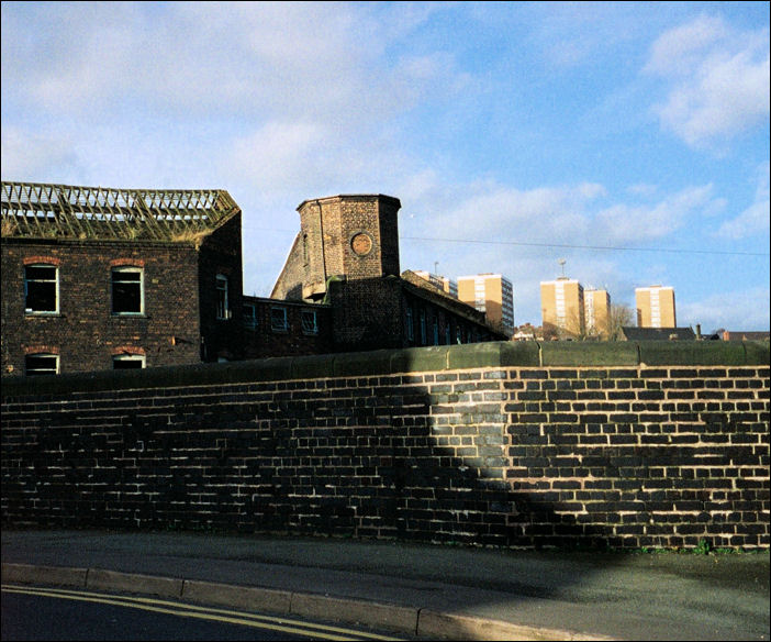 the Albion Bridge on Eastwood Road - which runs over the Caldon Canal - the Hanley Works to the left 