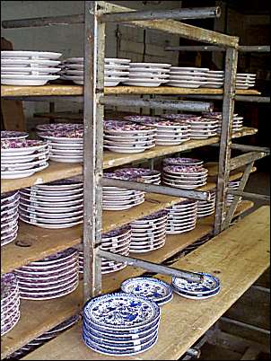 Plates which have been decorated by printing on the curvex
