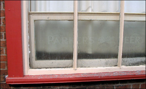 Acid-etched original windows tell you it was first owned by Parkers Brewery