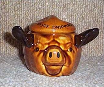 Hand painted, pottery pig by Szeiler. 