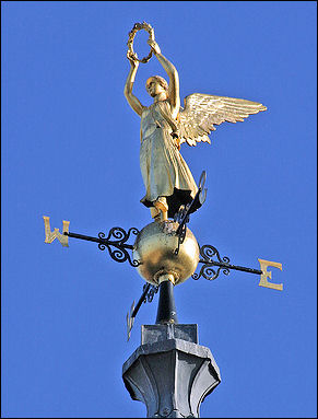 the gold angel of the Town Hall spire