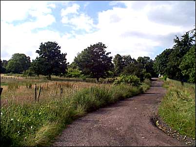 to the right the path around the park towards Fenton Cemetery