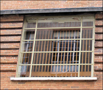 steel frame windows with inset brick stringers