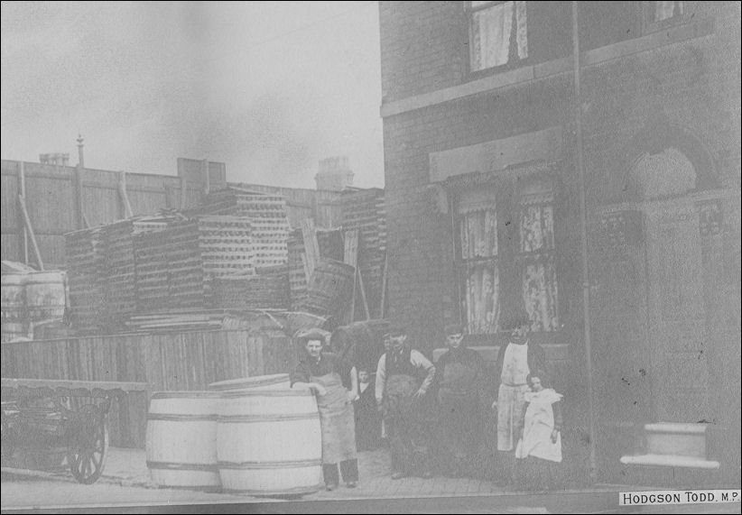The Sale family outside their house in Trubshawe Street - next to the cooper yard