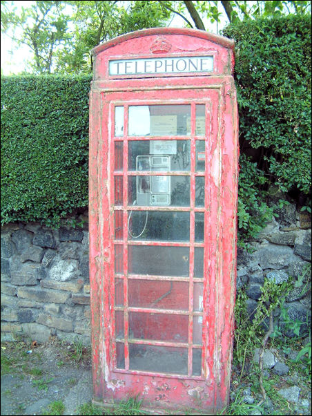 Red telephone box near Tongue Lane along Bemersley Road in the north of the City
