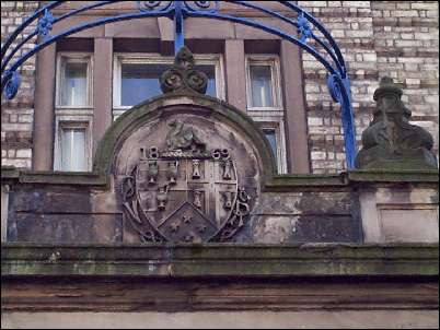 Detail of crest above the town hall door.