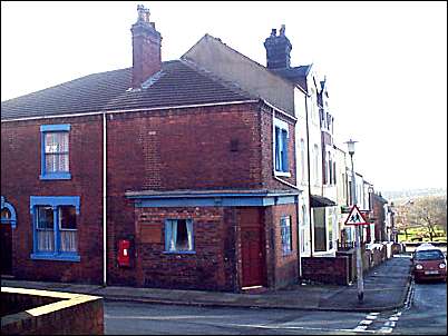 The house used to be a Post Office as can be seen by the Post Box in the wall. 