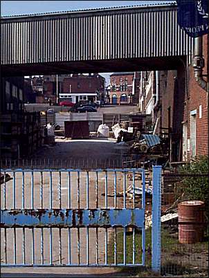 Alongside Woodbank Street is the factory of Johnson Matthey.