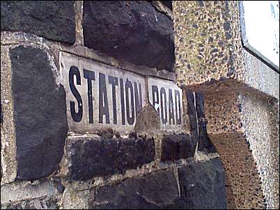 The sign behind shows that this road used to be called 'Station Road'